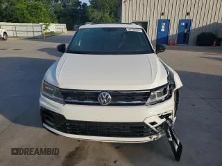 2021 Volkswagen Tiguan SE z VIN 3VV3B7AX5MM136155, wystawiony jako Copart lot #56120395 z przebiegiem 59 421 mil mil oraz Szkoda całkowita • Salvage title. Historia ofert i sprzedaży dostępna na DreamBid. Obrazek 5.