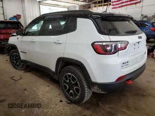 2025 Jeep Compass Trailhawk with VIN 3C4NJDDN8ST529024, listed as a Copart auction lot 61383465 with 4,233 mi miles and Salvage title. Bid and sale history available at DreamBid. Image 2.