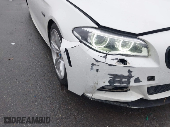2014 BMW 5 Series 535d with VIN WBAXA5C58ED690612, listed as a IAAI auction lot 41570616 with 95,124 mi miles and . Bid and sale history available at carsss.com. Image 6.