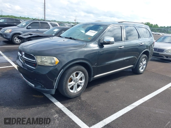 2011 Dodge Durango Crew with VIN 1D4RD4GG6BC651434, listed as a IAAI auction lot 42156389 with 505,373 mi miles and . Bid and sale history available at carsss.com. Image 2.