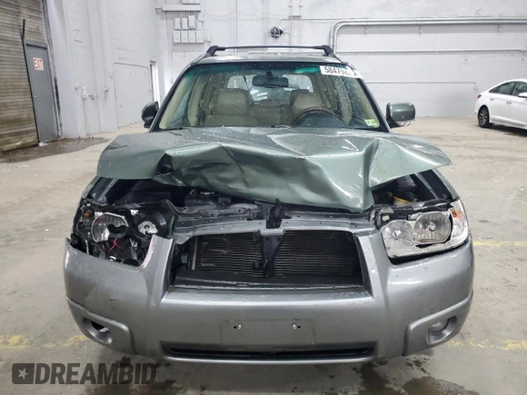 2007 Subaru Forester X L.L. Bean z VIN JF1SG67697H739094, wystawiony jako Copart lot #58479625 z przebiegiem 249 539 mil mil oraz Szkoda całkowita • Salvage title. Historia ofert i sprzedaży dostępna na DreamBid. Obrazek 5.