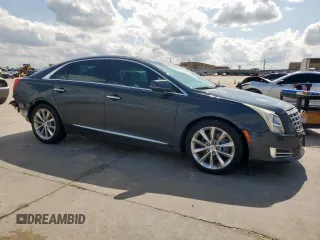 2013 Cadillac XTS Luxury with VIN 2G61P5S34D9244625, listed as a Copart auction lot 57832495 with 125,955 mi miles and Salvage title. Bid and sale history available at DreamBid. Image 4.
