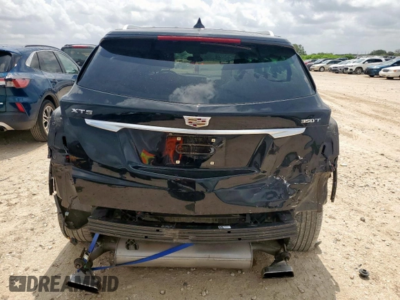 2021 Cadillac XT5 FWD Luxury with VIN 1GYKNAR42MZ120996, listed as a Copart auction lot 63314655 with 49,977 mi miles and Salvage title. Bid and sale history available at DreamBid. Image 6.