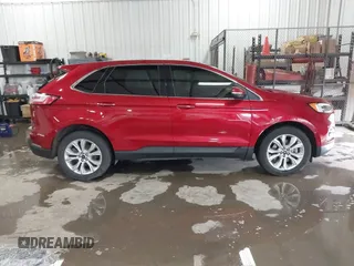 2020 Ford Edge Titanium z VIN 2FMPK4K98LBB39819, wystawiony jako IAAI lot #41947377 z przebiegiem 69 467 mil mil oraz . Historia ofert i sprzedaży dostępna na DreamBid. Obrazek 13.