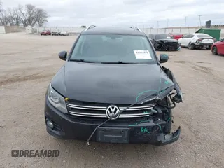 2016 Volkswagen Tiguan S with VIN WVGBV7AX9GW566451, listed as a IAAI auction lot 41393999 with 51,616 mi miles and . Bid and sale history available at DreamBid. Image 13.