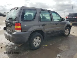 2005 Ford Escape XLS Value with VIN 1FMYU02Z35KA59568, listed as a Copart auction lot 71720604 with 184,007 mi miles and Salvage Title. Bid and sale history available at carsss.com. Image 3.