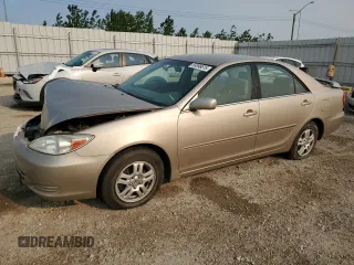 2002 Toyota Camry LE z VIN JTDBE32K420082649, wystawiony jako Copart lot #59398615 z przebiegiem 291 220 mil mil oraz Szkoda całkowita • Salvage title. Historia ofert i sprzedaży dostępna na DreamBid. Obrazek 1.
