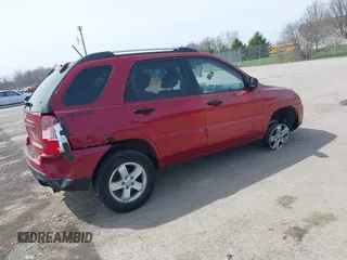 2010 Kia Sportage LX with VIN KNDKGCA39A7709095, listed as a IAAI auction lot 42017606 with 108,774 mi miles and . Bid and sale history available at carsss.com. Image 4.