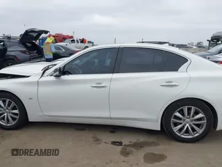 2015 Infiniti Q50 Premium z VIN JN1BV7AP2FM344044, wystawiony jako IAAI lot #42217012 z przebiegiem 155 714 mil mil oraz . Historia ofert i sprzedaży dostępna na DreamBid. Obrazek 14.