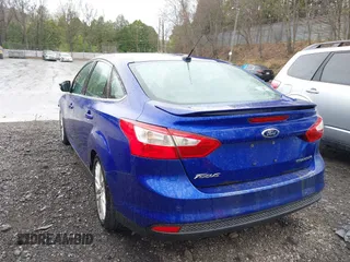 2014 Ford Focus Titanium with VIN 1FADP3J28EL240911, listed as a IAAI auction lot 42082812 with 144,625 mi miles. Bid and sale history available at carsss.com. Image 16.