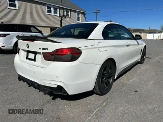 2014 BMW 4 Series 435i with VIN WBA3T3C57EP736698, listed as a Copart auction lot 52739335 with 104,403 mi miles and Clean Title. Bid and sale history available at carsss.com. Image 3.