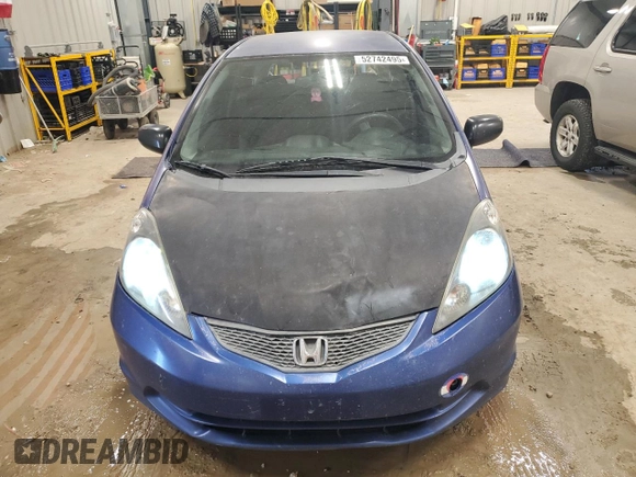 2009 Honda Fit with VIN JHMGE88229S044859, listed as a Copart auction lot 52742495 with 398,726 mi miles and Salvage Title. Bid and sale history available at carsss.com. Image 5.