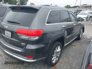 2014 Jeep Grand Cherokee Summit with VIN 1C4RJFJG8EC434899, listed as a IAAI auction lot 42399912 with 186,840 mi miles and . Bid and sale history available at DreamBid. Image 4.