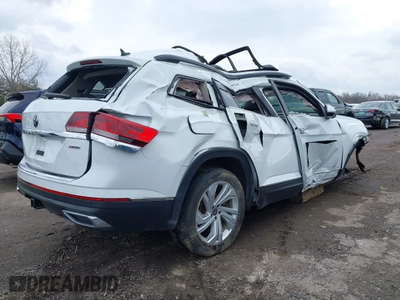 2022 Volkswagen Atlas SE z VIN 1V2KR2CA0NC517561, wystawiony jako IAAI lot #41653225 z przebiegiem 40 782 mil mil oraz . Historia ofert i sprzedaży dostępna na DreamBid. Obrazek 4.