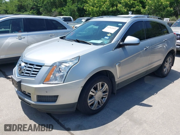 2015 Cadillac SRX Luxury Collection z VIN 3GYFNBE35FS627640, wystawiony jako IAAI lot #42262843 z przebiegiem 211 669 mil mil oraz . Historia ofert i sprzedaży dostępna na DreamBid. Obrazek 2.
