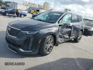 2021 Cadillac XT6 Premium Luxury z VIN 1GYKPCRS9MZ156219, wystawiony jako Copart lot #58138955 z przebiegiem Nie podano mil oraz Szkoda całkowita • Salvage title. Historia ofert i sprzedaży dostępna na DreamBid. Obrazek 1.