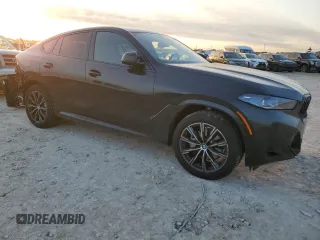 2025 BMW X6 xDrive40i with VIN 5UX33EX09S9Y26463, listed as a Copart auction lot 84269334 with 1,970 mi miles and Salvage Title. Bid and sale history available at carsss.com. Image 4.
