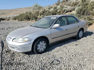 1999 Honda Accord LX with VIN 1HGCG6656XA003201, listed as a Copart auction lot 64115945 with Not provided miles and Clean title. Bid and sale history available at DreamBid. Image 1.