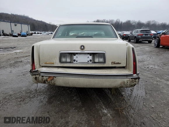1995 Cadillac DeVille z VIN 1G6KD52B8SU274053, wystawiony jako Copart lot #86429934 z przebiegiem 100 496 mil mil oraz Szkoda całkowita • Salvage title. Historia ofert i sprzedaży dostępna na DreamBid. Obrazek 6.