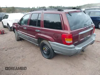 2001 Jeep Grand Cherokee Laredo z VIN 1J4GX48S41C585151, wystawiony jako IAAI lot #41020660 z przebiegiem Nie podano mil oraz . Historia ofert i sprzedaży dostępna na DreamBid. Obrazek 3.
