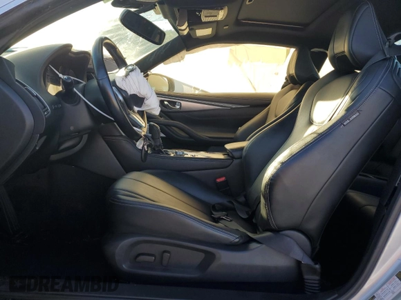 2018 Infiniti Q60 Sport with VIN JN1EV7EL3JM390639, listed as a Copart auction lot 74460834 with 76,707 mi miles and Salvage title. Bid and sale history available at DreamBid. Image 7.
