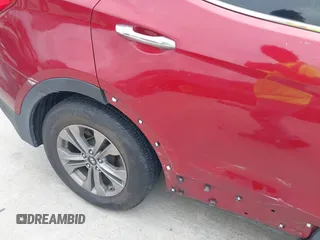 2016 Hyundai Santa Fe z VIN 5XYZT3LB1GG321854, wystawiony jako IAAI lot #40244942 z przebiegiem Nie podano mil oraz . Historia ofert i sprzedaży dostępna na DreamBid. Obrazek 12.