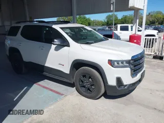 2021 GMC Acadia AT4 with VIN 1GKKNLLS0MZ102445, listed as a IAAI auction lot 41827776 with 105,336 mi miles. Bid and sale history available at carsss.com. Image 1.