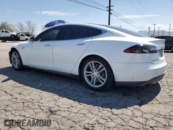 2013 Tesla Model S with VIN 5YJSA1CGXDFP03603, listed as a Copart auction lot 49352135 with 129,203 mi miles and Salvage title. Bid and sale history available at DreamBid. Image 2.