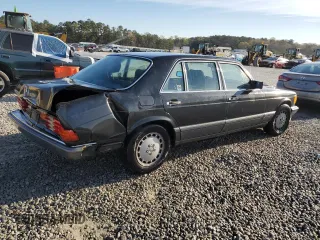 1989 Mercedes-Benz 560 with VIN WDBCA39E9KA463003, listed as a Copart auction lot 49808495 with 125,388 mi miles and Salvage Title. Bid and sale history available at DreamBid. Image 3.