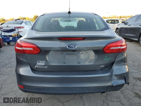 2017 Ford Focus SE z VIN 1FADP3F25HL331714, wystawiony jako Copart lot #77389764 z przebiegiem 49 953 mil mil oraz Szkoda całkowita • Salvage title. Historia ofert i sprzedaży dostępna na DreamBid. Obrazek 6.