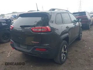 2018 Jeep Cherokee Trailhawk with VIN 1C4PJMBB0JD564792, listed as a IAAI auction lot 42513208 with 173,484 mi miles and . Bid and sale history available at DreamBid. Image 4.