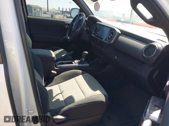 2023 Toyota Tacoma SR5 z VIN 3TMDZ5BN5PM148049, wystawiony jako IAAI lot #41648232 z przebiegiem 22 570 mil mil oraz . Historia ofert i sprzedaży dostępna na DreamBid. Obrazek 5.