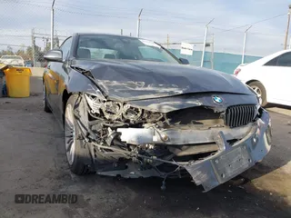 2014 BMW 4 Series 428i with VIN WBA3N7C5XEF719384, listed as a IAAI auction lot 41694678 with 115,517 mi miles and . Bid and sale history available at carsss.com. Image 6.