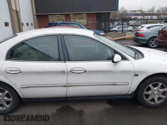 2000 Mercury Sable LS Premium with VIN 1MEFM55S5YG613920, listed as a IAAI auction lot 41360961 with 108,829 mi miles. Bid and sale history available at carsss.com. Image 13.