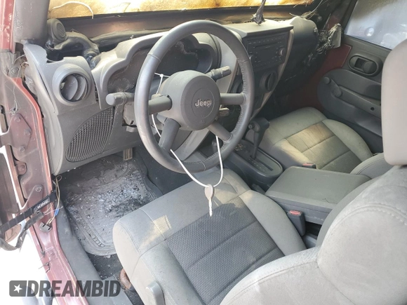 2008 Jeep Wrangler X with VIN 1J4FA24118L538510, listed as a Copart auction lot 59258615 with Not provided miles and Salvage title. Bid and sale history available at DreamBid. Image 8.