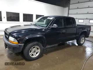 2003 Dodge Dakota Sport with VIN 1D7HG38X23S299507, listed as a Copart auction lot 67698734 with 146,696 mi miles and Salvage Title. Bid and sale history available at carsss.com. Image 1.