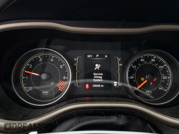 2015 Jeep Cherokee Latitude with VIN 1C4PJLCB9FW706934, listed as a Copart auction lot 52696105 with 125,205 mi miles and Salvage Title. Bid and sale history available at DreamBid. Image 9.