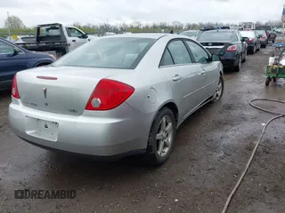 2006 Pontiac G6 6-Cyl with VIN 1G2ZG558464289212, listed as a IAAI auction lot 41994843 with 126,502 mi miles. Bid and sale history available at carsss.com. Image 4.