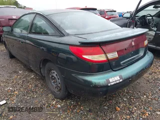 1997 Saturn SC z VIN 1G8ZG1277VZ342397, wystawiony jako IAAI lot #41966570 z przebiegiem 184 054 mil mil oraz . Historia ofert i sprzedaży dostępna na DreamBid. Obrazek 3.