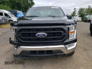 2021 Ford F-150 XL with VIN 1FTFW1ED0MFB39526, listed as a Copart auction lot 83764754 with 65,581 mi miles and Salvage Title. Bid and sale history available at carsss.com. Image 5.