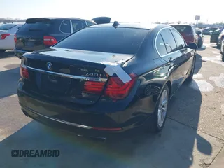 2013 BMW 7 Series 740i with VIN WBAYA6C55DC995094, listed as a IAAI auction lot 41246796 with 164,394 mi miles. Bid and sale history available at carsss.com. Image 4.