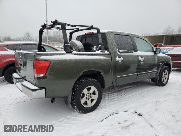 2004 Nissan Titan LE z VIN 1N6AA07B84N519070, wystawiony jako Copart lot #44267185 z przebiegiem 325 656 mil mil oraz Czysty tytuł • Clean title. Historia ofert i sprzedaży dostępna na DreamBid. Obrazek 3.
