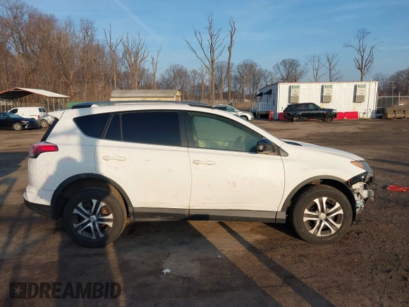 2017 Toyota RAV4 LE with VIN JTMZFREV7HJ120317, listed as a IAAI auction lot 41166489 with 144,799 mi miles and . Bid and sale history available at carsss.com. Image 14.