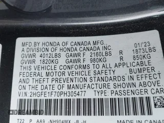 2023 Honda Civic Sedan EX with VIN 2HGFE1F70PH305477, listed as a IAAI auction lot 41058060 with 46,761 mi miles. Bid and sale history available at carsss.com. Image 9.