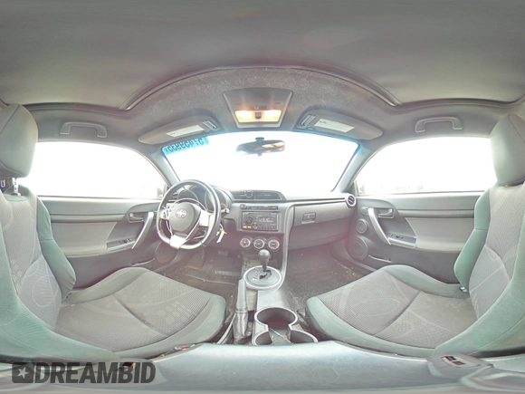 2013 Scion tC z VIN JTKJF5C77D3056779, wystawiony jako Copart lot #57459935 z przebiegiem 157 420 mil mil oraz Szkoda całkowita • Salvage title. Historia ofert i sprzedaży dostępna na DreamBid. Obrazek 14.