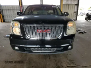 2009 GMC Yukon Denali z VIN 1GKFK03269R144974, wystawiony jako Copart lot #49354815 z przebiegiem 141 569 mil mil oraz Szkoda całkowita • Salvage title. Historia ofert i sprzedaży dostępna na DreamBid. Obrazek 5.