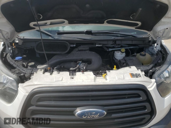 2019 Ford Transit with VIN 1FTYE1CM8KKA51956, listed as a Copart auction lot 74922524 with 24,790 mi miles and Salvage Title. Bid and sale history available at DreamBid. Image 12.