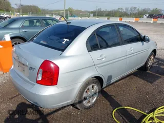 2011 Hyundai Accent GLS with VIN KMHCN4AC3BU608827, listed as a IAAI auction lot 41994266 with 226,912 mi miles. Bid and sale history available at carsss.com. Image 4.