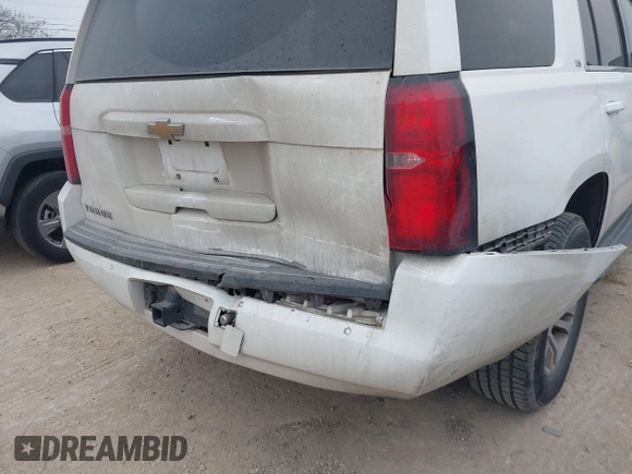 2015 Chevrolet Tahoe LS with VIN 1GNSCAEC2FR641252, listed as a IAAI auction lot 41528667 with 183,796 mi miles and . Bid and sale history available at DreamBid. Image 6.