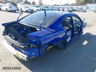 2021 Dodge Charger Scat Pack Widebody with VIN 2C3CDXGJ8MH557706, listed as a IAAI auction lot 40592670 with 1 mi miles. Bid and sale history available at carsss.com. Image 4.